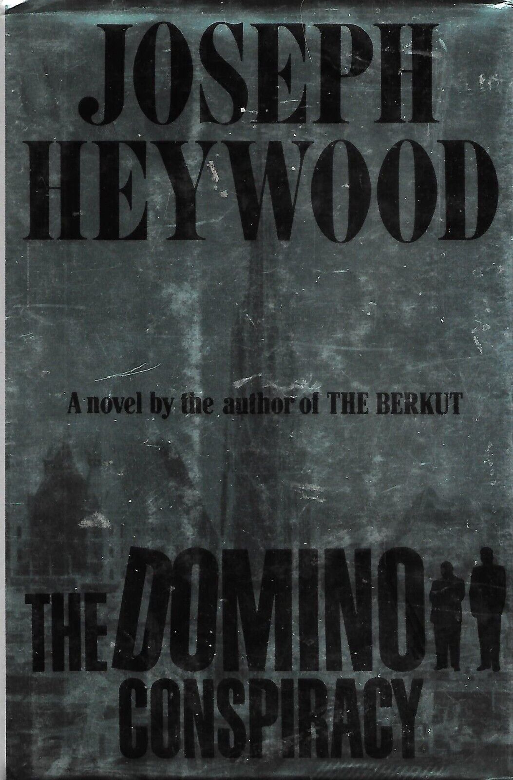Heywood, Joseph THE DOMINO CONSPIRACY 1st Edition 1st Printing