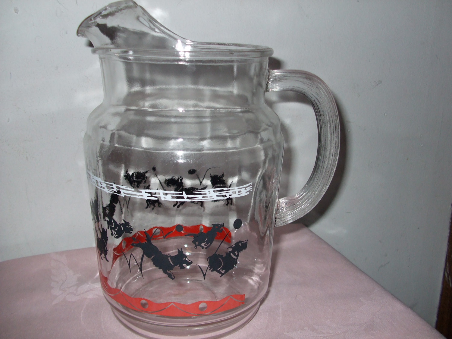 Vintage clear glass pitcher with a cork lid and 50 similar items