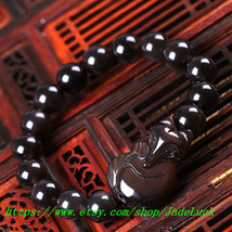 Hand-carved natural obsidian bracelet rainbow obsidian eyes fox handmade jewelry - $28.99