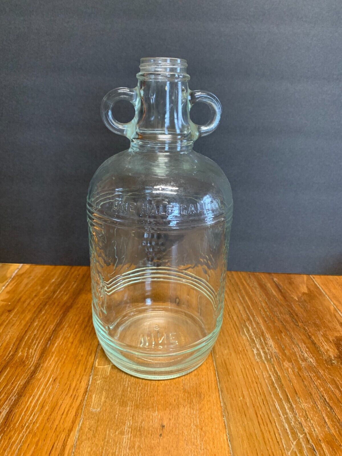 Vintage clear glass pitcher with a cork lid and 50 similar items