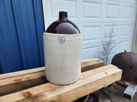 Sold at Auction: 2 Small Blue Band Stoneware Crock and Jug Sizes Jug 7 in.  (17.8 cm.), Crock 6 1/2 x 6 in. (16.5 x 15.2 cm.)