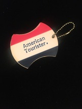 Vintage 70s American Tourister luggage tag (used)
