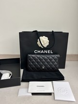 Authentic Chanel Black Quilted Lambskin and 13 similar items
