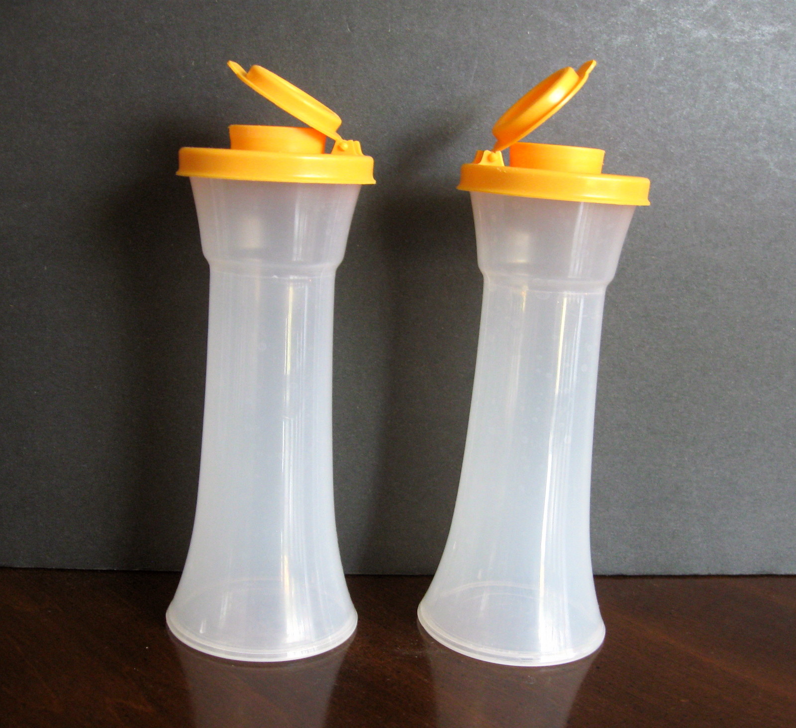  Tupperware Hourglass Salt And Pepper Shaker Lids Large Size:  Home & Kitchen