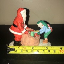 Christmas Santa Claus and Elf in Toy Sack Figurine Hallmark Store 1997 Vintage - $17.35