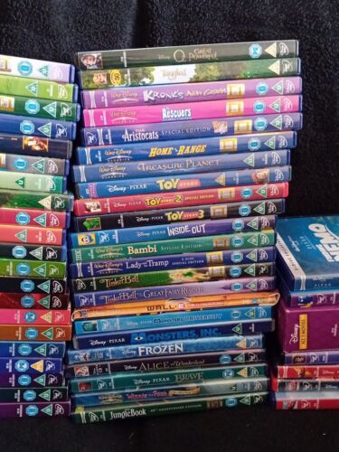 53 Walt Disney Pixar DVDs Some Classics Lion King Aladdin Cars Toy ...