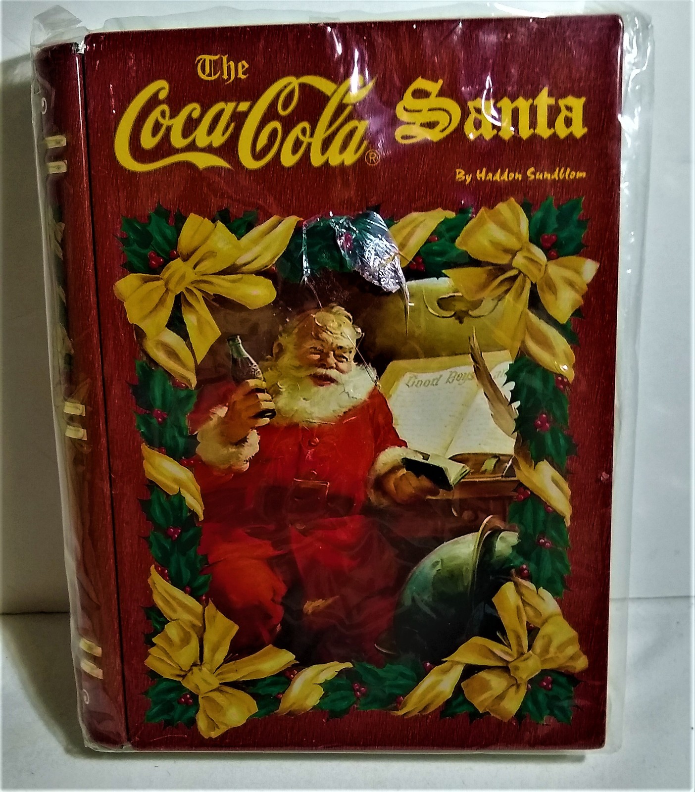 Coca-Cola Santa Book Shaped Tin Haddon NEW - $11.00