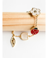 Carnelian, Onyx, and Mother of Pearl Ladybug and Flowers Bracelet in Gold - $75.00