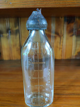 Owens Illinois 4 ounce Baby Bottle with Davol Anti-Colic-Sani-Tab Nipple  - $8.00