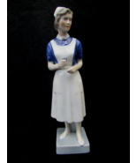 Royal Copenhagen, rare porcelain figurine of a nurse. Model: 4507/156. - $960.30