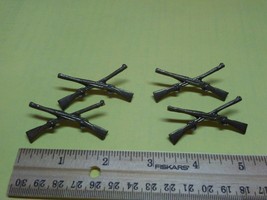 Military hat pins or uniform decorations? - $12.30