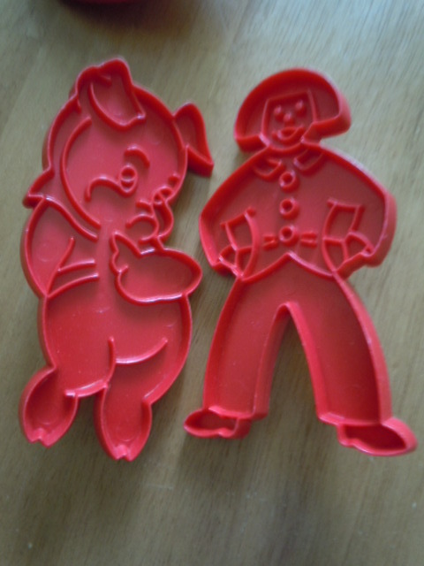 Tupperware red plastic holiday cookie cutters - vintage baking