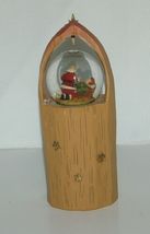 Roman Inc Peace Arch Snow Globe Kneeling Santa 8 Inches Tall image 5