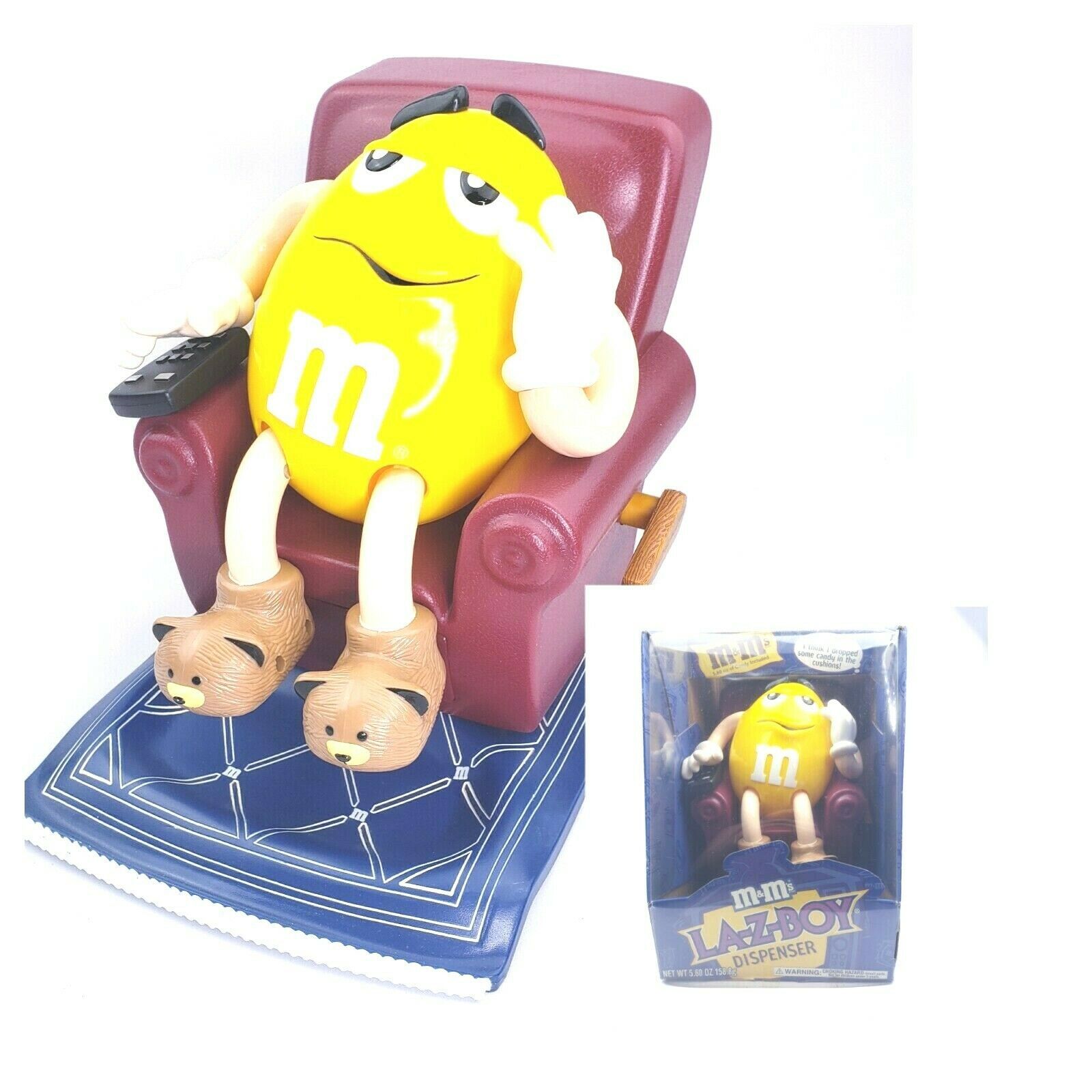 Yellow Peanut M&M's Character Candy Dispenser Sitting On Recliner Chair