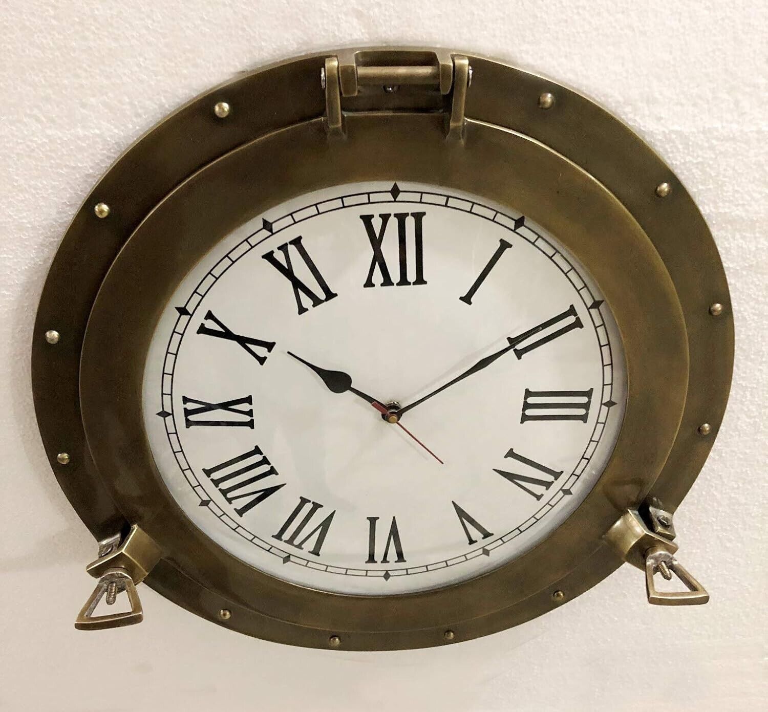 brass ship porthole clock 22.86 cm