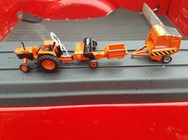 Toy Tonka Tractor and 2 Attachments - $29.99