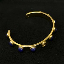Kate Spade Cuff Bracelet Gold Tone with Round Blue Stones 2 1/4&quot; Diameter - $14.01