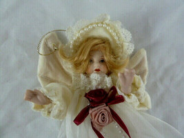 Victorian Style Christmas Ornament porcelain and chiffon cloth ornament 15" long - $9.89