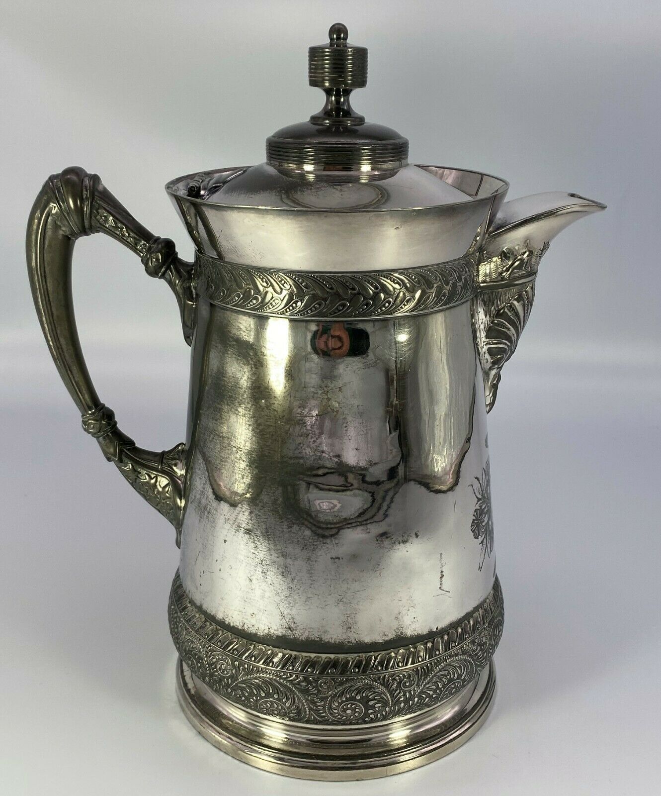 silver and silver plate: St. Louis Silver Syrup Pitcher