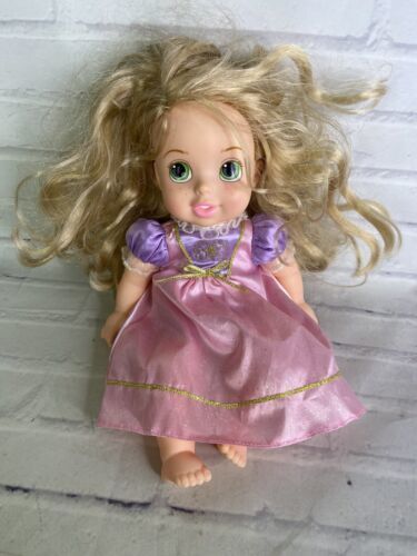 Primary image for Tollytots Disney Tangled Princess Rapunzel Baby Doll With Pink Outfit Tolly Tots