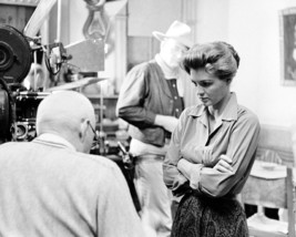 Angie Dickinson and John Wayne in Rio Bravo on set with Howard Hawks 16x20 Canva - $69.99