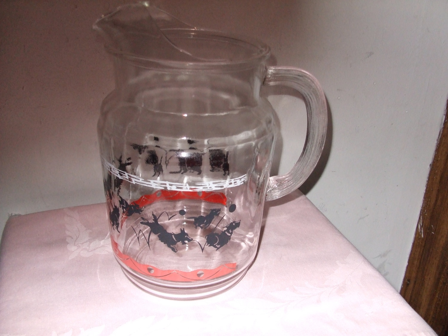 Vintage clear glass pitcher with a cork lid and 50 similar items