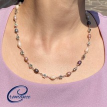 Rosary necklace build in steel, with pirple, pink, cream beads and metal... - $31.00