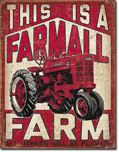 This is a Farmall Farm Farming Tractor Farm Equipment Metal Sign - $20.95