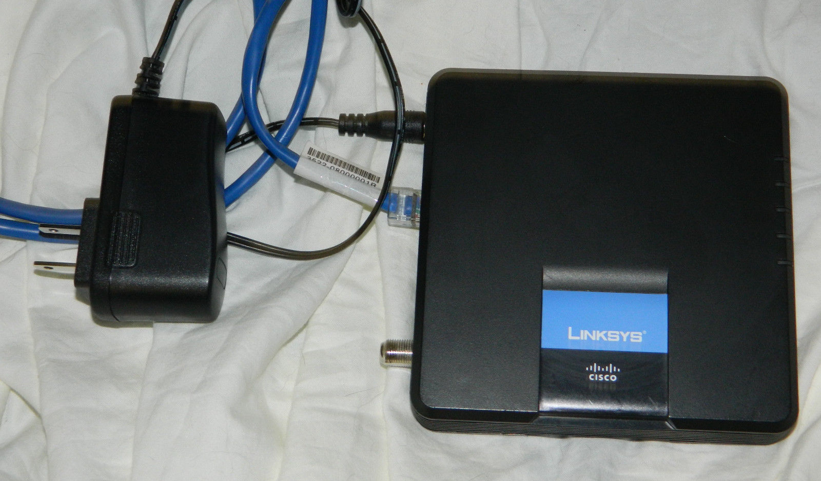 LINKSYS Cable Modem 100 Mbps model # CM100 with Ethernet Cable and Power Supply - $15.85