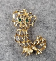 VTG Puppy Dog Green Rhinestone Eyes Gold Tone Brooch Pin Avon Animal Jewelry - $12.99