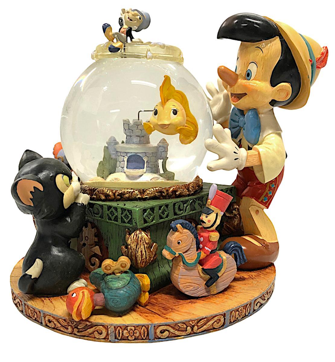 Disney Snowglobe Pinocchio toyland fishbowl musical snow globe - $149.00